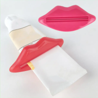 Видавлювач для тюбика зубної пасти Затискач прес для видавлювання з тюбиків пластиковий Губи 2 штуки L 9 cm